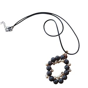 Black and Gold Circular Beaded Necklace